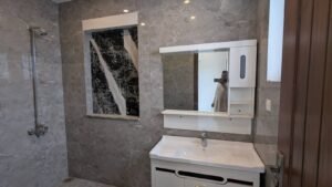 modern bathroom in 10 Marla house Bahria Town Phase 8