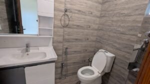 modern bathroom in 7 Marla house Bahria Town Phase 8